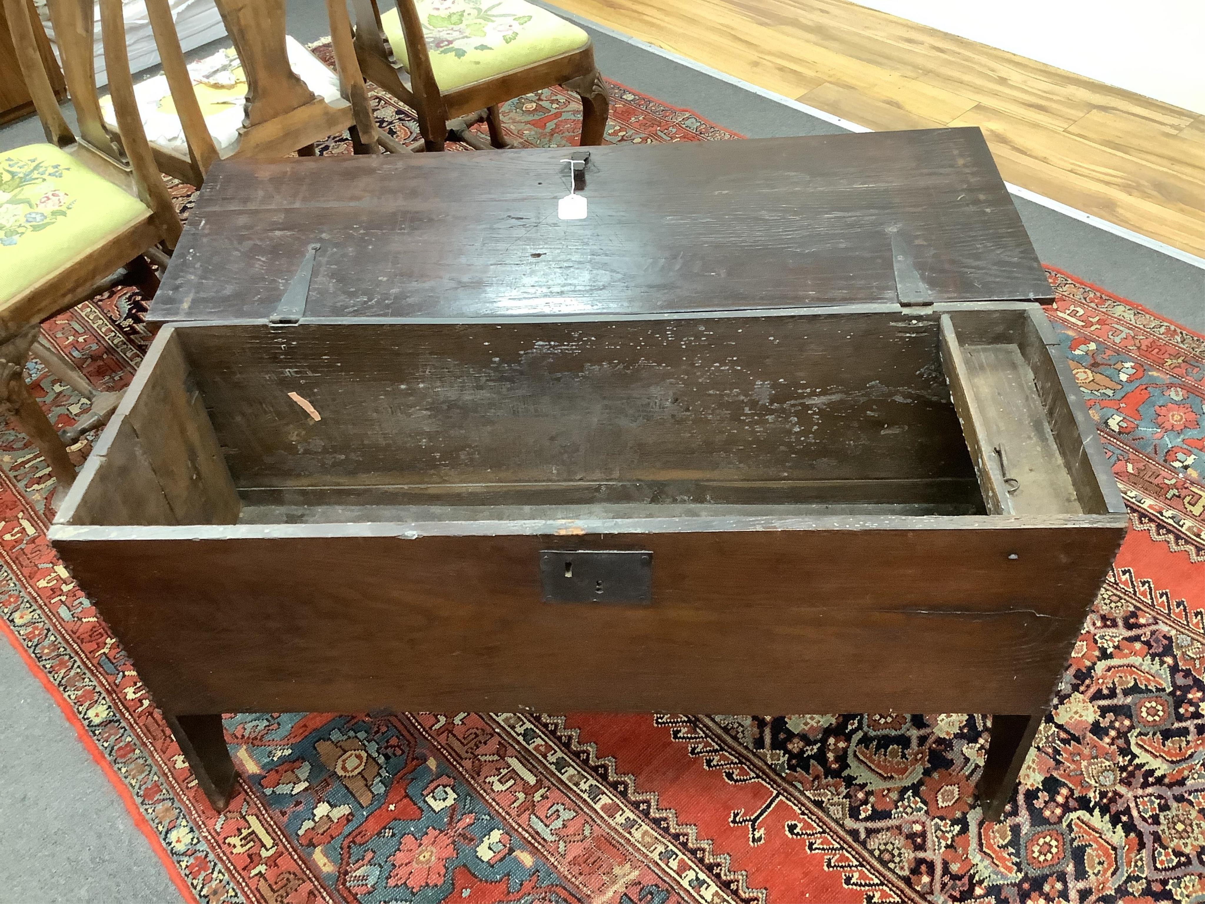 An 18th century oak six plank coffer, width 109cm, depth 37cm, height 61cm. Condition - fair